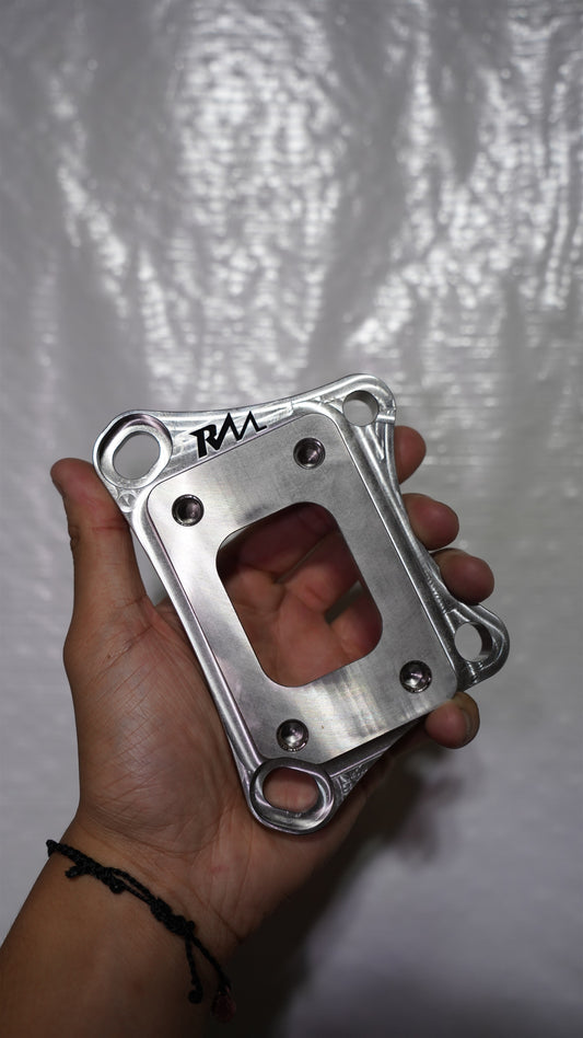 Revive Motorsports L15B/K20C T25 turbo adapter. Front view with RM engraving